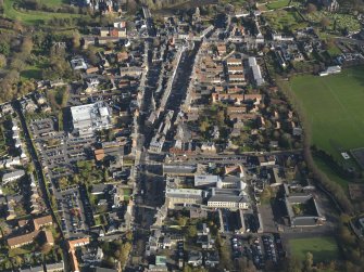 General oblique aerial view centred on the central area of the town, taken from the WSW.