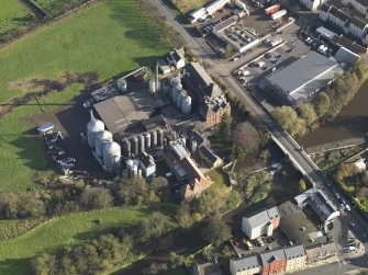 Oblique aerial view centred on the mills, taken from the WNW.