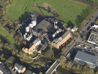 Oblique aerial view centred on the mills, taken from the SW.