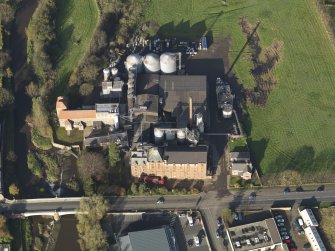 Oblique aerial view centred on the mills, taken from the S.