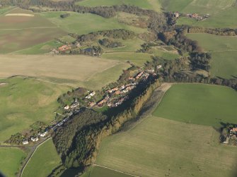 General oblique aerial view centred on the village, taken from the SW.