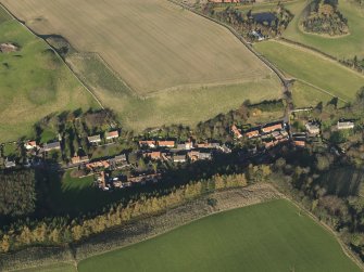 General oblique aerial view centred on the village, taken from the SSW.