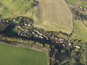 General oblique aerial view centred on the village, taken from the SSE.