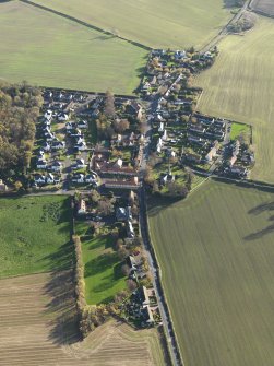 General oblique aerial view of the village, taken from the NW.