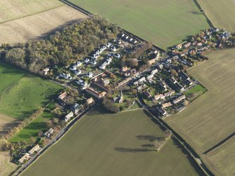 General oblique aerial view of the village, taken from the W.