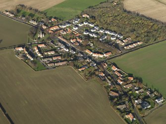 General oblique aerial view of the village, taken from the SSW.