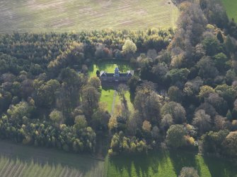 Oblique aerial view centred on the stable block, taken from the NNE.