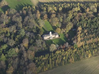 Oblique aerial view centred on the stable block, taken from the SSW.