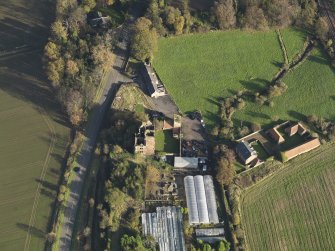 Oblique aerial view centred on the country/tower house, taken from the, taken from the W.