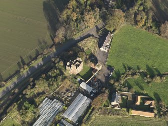 Oblique aerial view centred on the country/tower house, taken from the, taken from the WSW.