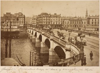 General view.
Titled: 'Glasgow - Broomielaw Bridge at head of navigation on Clyde'.


