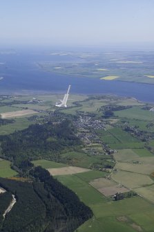 General oblique aerial view looking across the village of Evanton towards the quay and the Cromarty Firth, taken from the W.