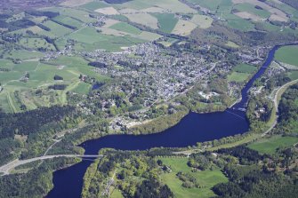 General oblique aerial view looking across Loch Faskally towards Pitlochry, taken from the W.
