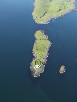 General oblique aerial view of Eilean Musdile and the Lismore lighthouse, taken from the SW.