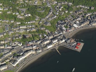 General oblique aerial view of Oban centred on the harbour, taken from the WNW.