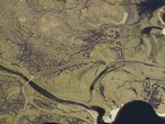 Oblique aerial view of the remains of Cabuie Lodge and township, taken from the S.