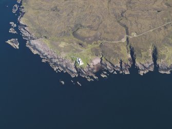 Oblique aerial view centred on the lighthouse at Ruadh Reidh, taken from the NW.