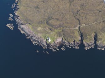 Oblique aerial view centred on the lighthouse at Ruadh Reidh, taken from the NW.