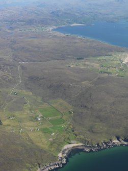 General oblique aerial view looking from North Erradale in the foreground to Gairloch in the distance, taken from the NW.