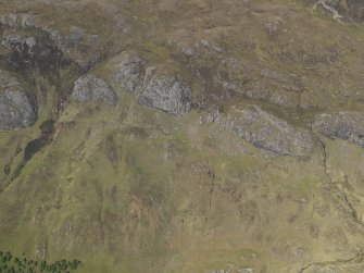 Oblique aerial view centred on the enclosure, taken from the SW.