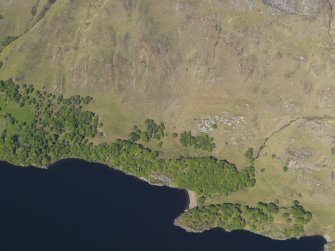 Oblique aerial view centred on the enclosure, taken from the SW.