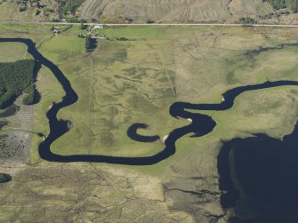 General oblique aerial view of Achanalt including the old river channels, taken from the S.
