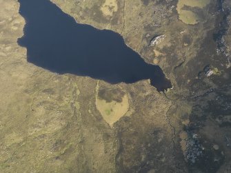 Oblique aerial view of the enclosure at Lochan An Cairill, taken from the SE.