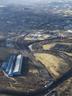 General oblique aerial view of Glasgow showing the route of the M74 extension going through the Rutherglen area, taken from the ENE.