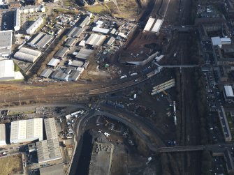 Oblique aerial view of the city showing the route of the M74 extension going through the Rutherglen area centred on Rutherglen railway station, taken from the W.