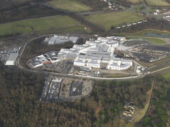 Oblique aerial view centred on the hospital, taken from the SW.