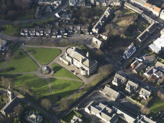General oblique aerial view of the park centred on the town hall, taken from the SE.