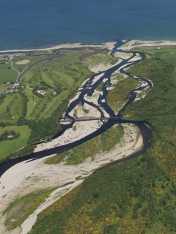 General oblique aerial view of the mouth of the River Spey centred on the Spey viaduct with the Garmouth and Kingston Golf Course beyond, taken from the S.