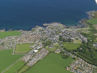 General oblique aerial view centred on the village of Portsoy, taken from the S.