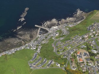 Oblique aerial view of the village of Gardenstown, taken from the S.