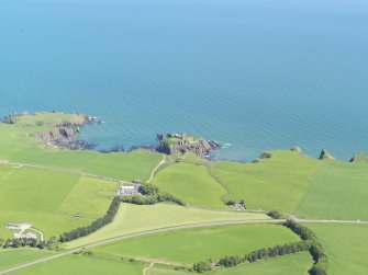 General oblique aerial view of the ruins of Dunnottar Castle, taken from the W.
