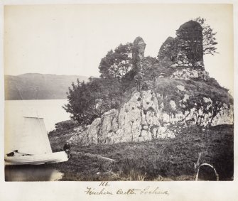 View of castle with sailing boat in foreground. Titled:  '166. Fincharn Castle, Lochawe'.
