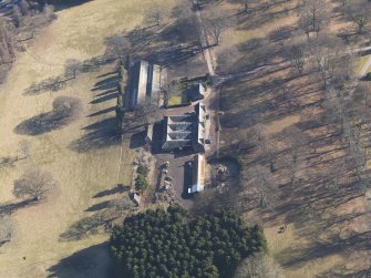 Oblique aerial view centred on the farmstead, taken from the W.