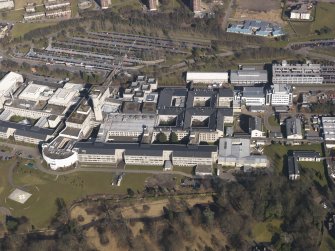 Oblique aerial view centred on the hospital, taken from the S.