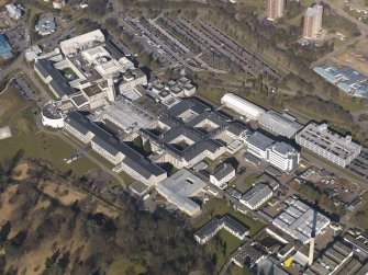 Oblique aerial view centred on the hospital, taken from the SE.