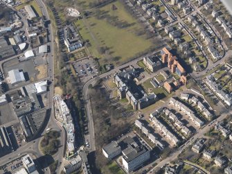 Oblique aerial view centred on the hospital, taken from the E.