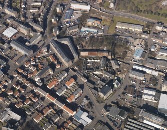 Oblique aerial view centred on the mills, taken from the SE.