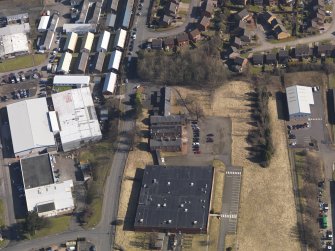 Oblique aerial view centred on the former officers' mess, taken from the WSW.