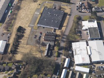 Oblique aerial view centred on the former officers' mess, taken from the ENE.