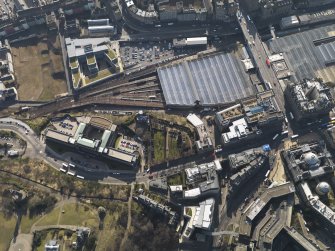 Oblique aerial view centred on St Andrews House, taken from the N.