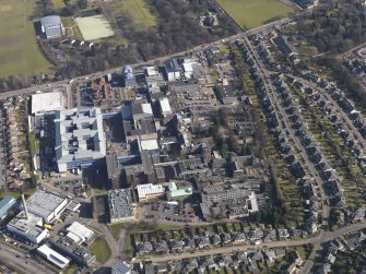 General oblique aerial view centred on the hospital, taken from the WSW.