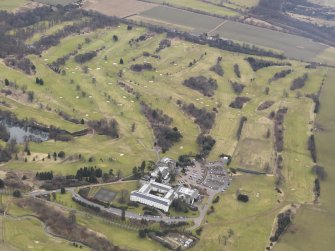 General oblique aerial view centred on Dalmahoy House with the country club adjacent from the NW.