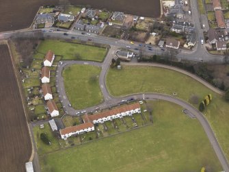 Oblique aerial view centred on the veterans village, taken from the SSW.