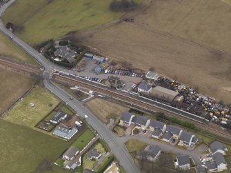 Oblique aerial view centred on the railway station, taken from the SE.