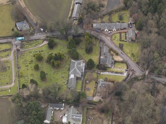 Oblique aerial view centred on the kirk, taken from the ENE.