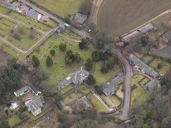 Oblique aerial view centred on the kirk, taken from the NE.